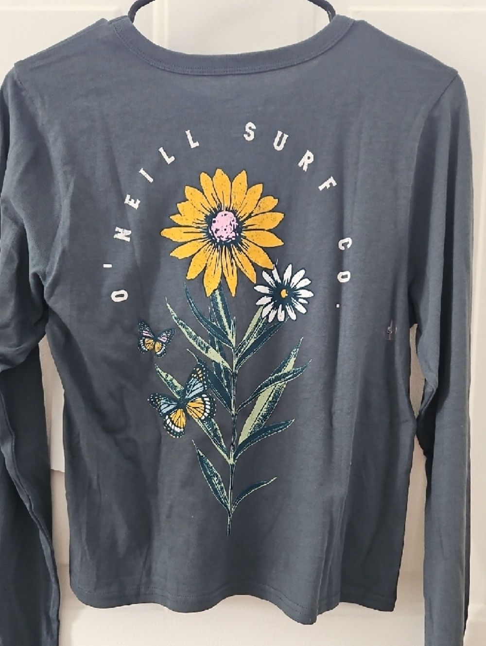 O'Neill Slate Blue Long Sleeve Tee with Daisy Chest & Butterfly Sleeve - Picture 2 of 5